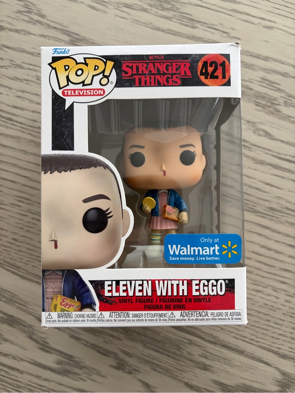Funko Pop! Stranger Things Eleven with Eggos Figure - Blue Jacket, Pink Dress